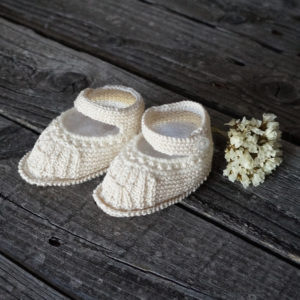 Hand knitted booties cream