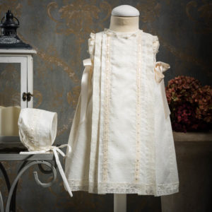 Embroidered batiste cotton dress with lace and satin ribbon bows