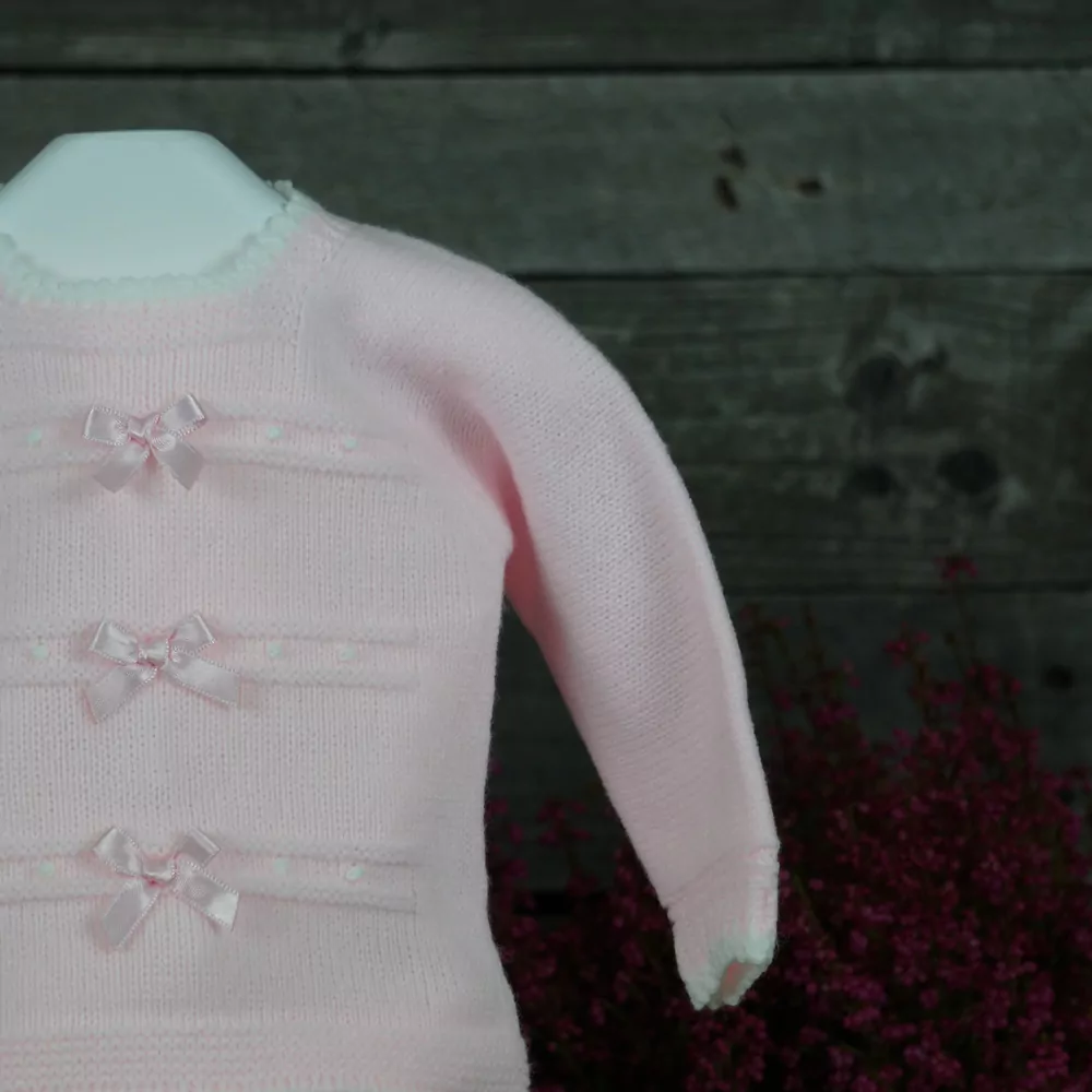 Detalle conjunto tres piezas rosa