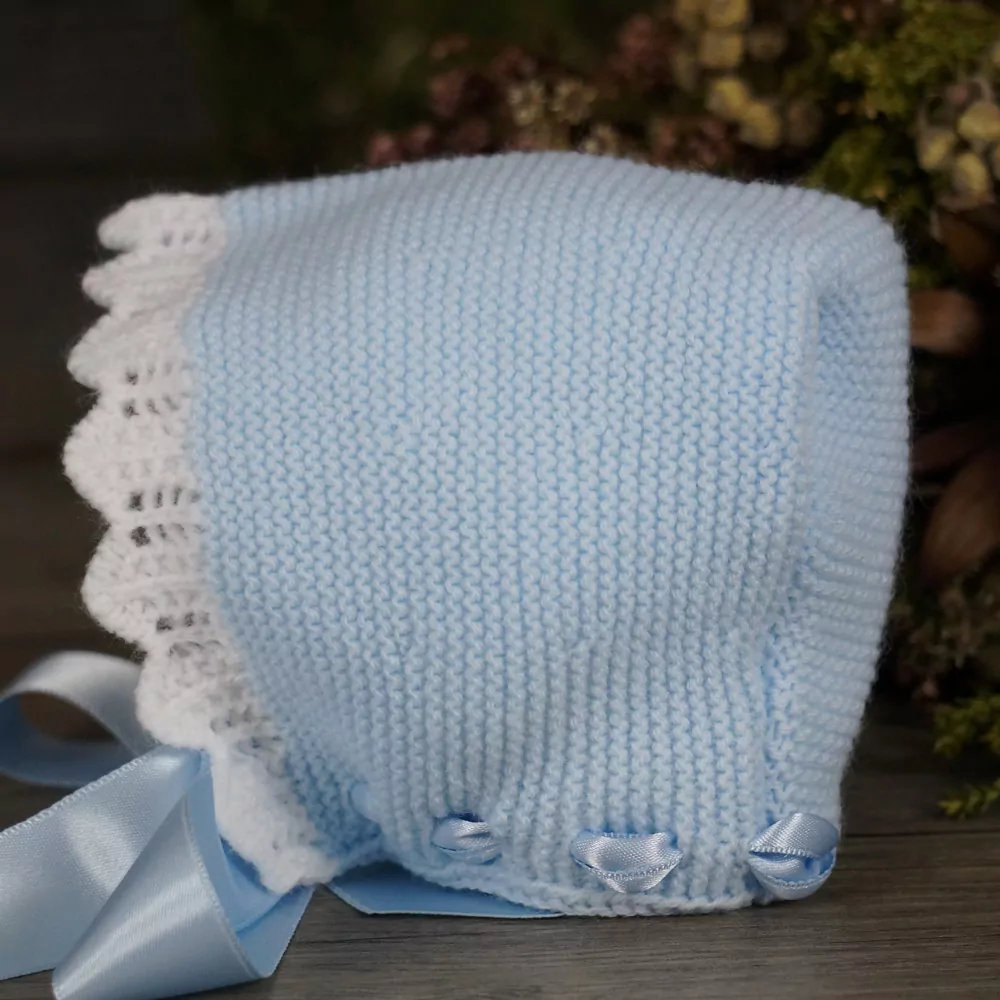 Capota de punto celeste y blanco