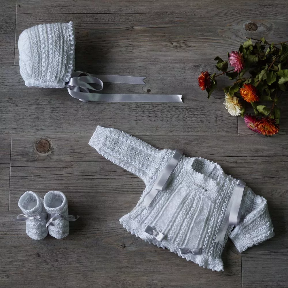 Heirloom hand knitted baby sweater set