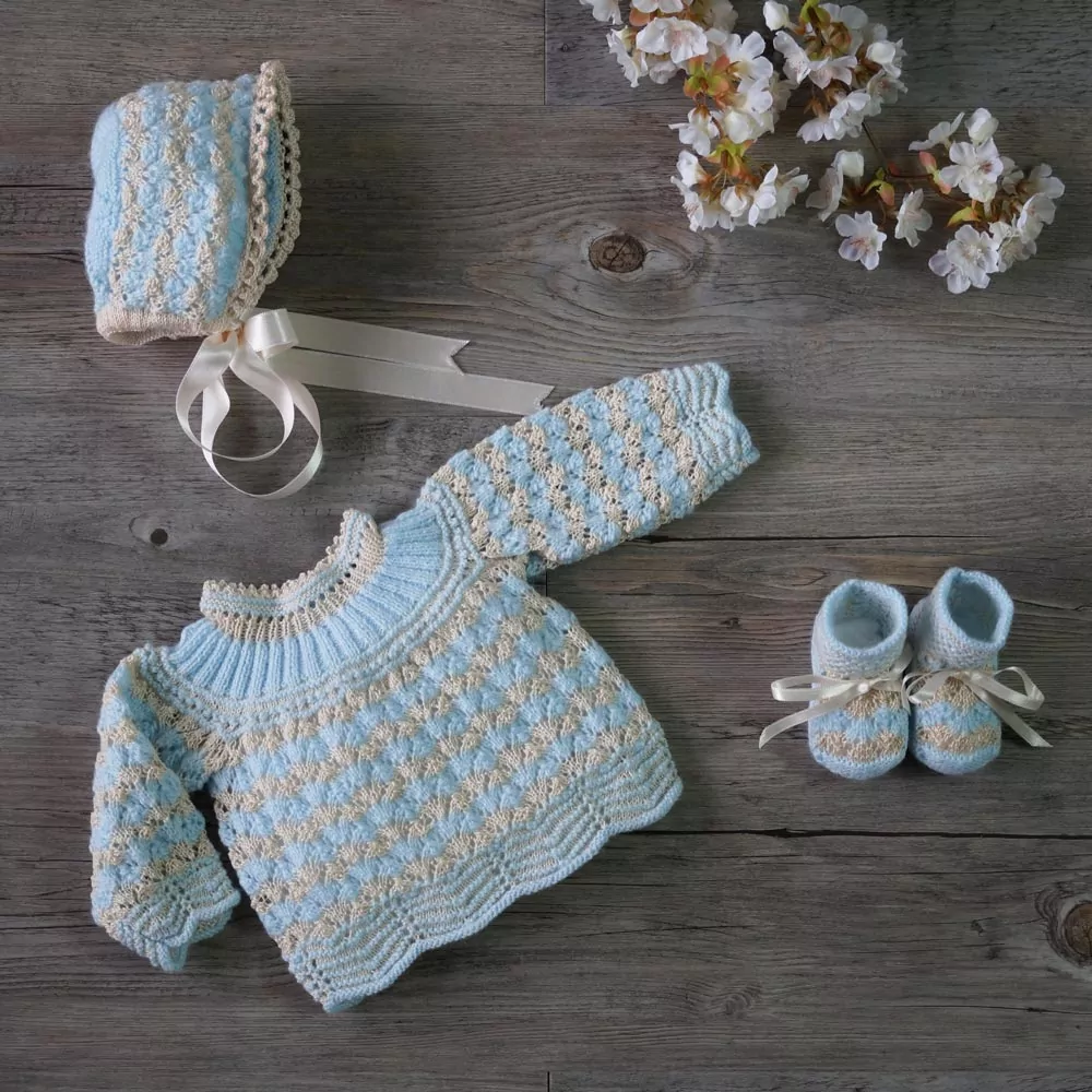 Conjunto chaqueta, gorro y patucos celeste y tostado