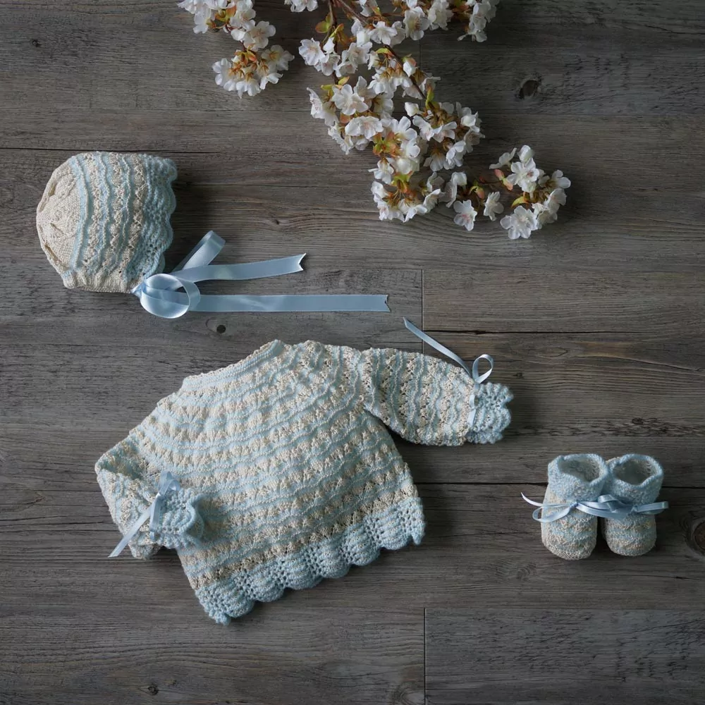 Heirloom hand knitted baby sweater set