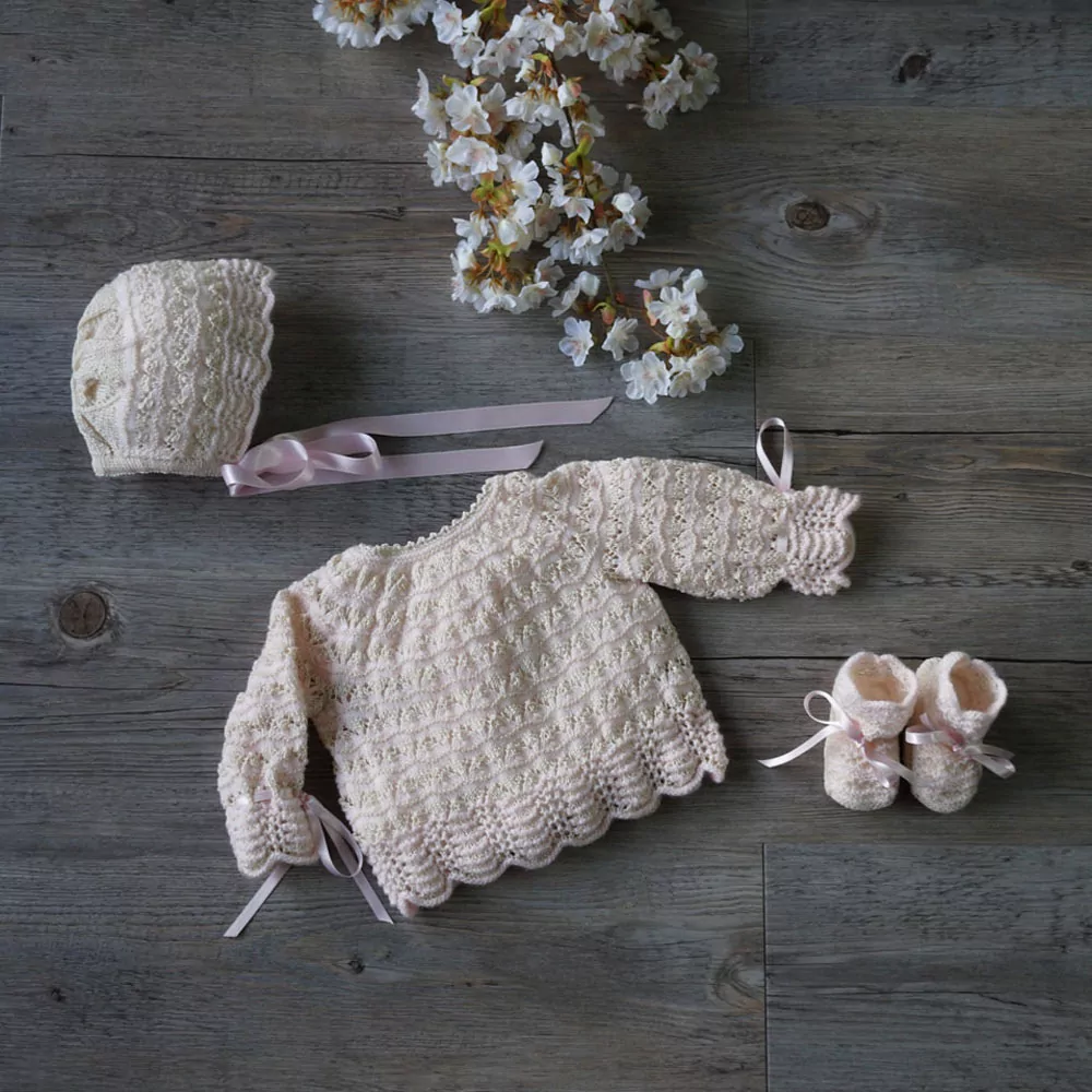 Heirloom hand knitted baby sweater set