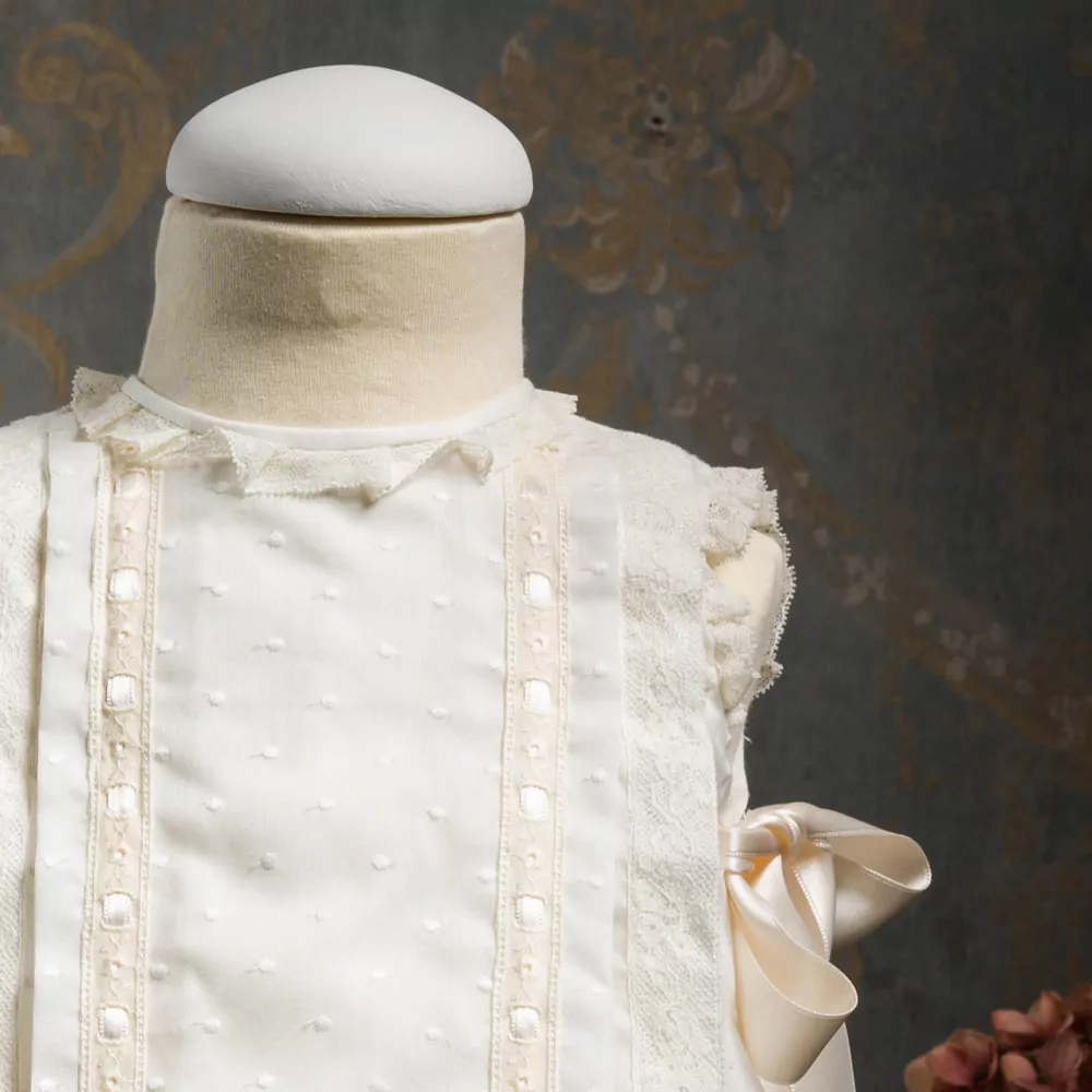 Embroidered batiste cotton dress with lace and satin ribbon bows - Image 2