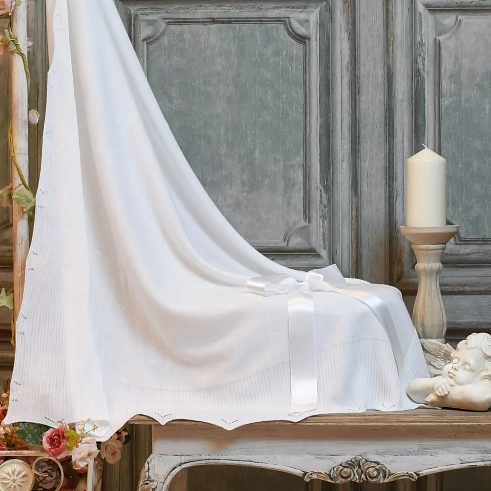 Manta o toquilla de punto en lana fina